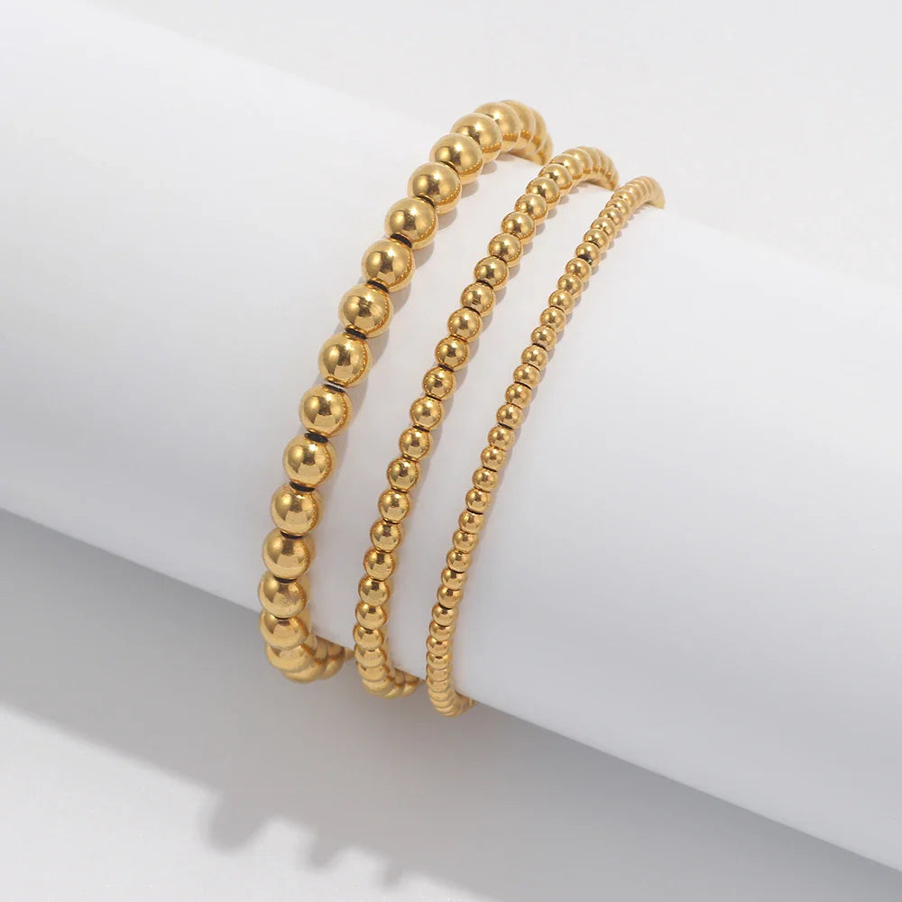 Lumière Perlé – 3-teiliges Armband-Set mit goldenen Perlen