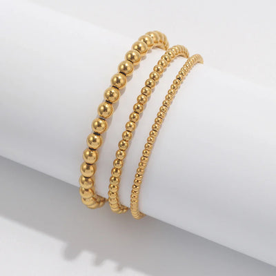 Lumière Perlé – 3-teiliges Armband-Set mit goldenen Perlen