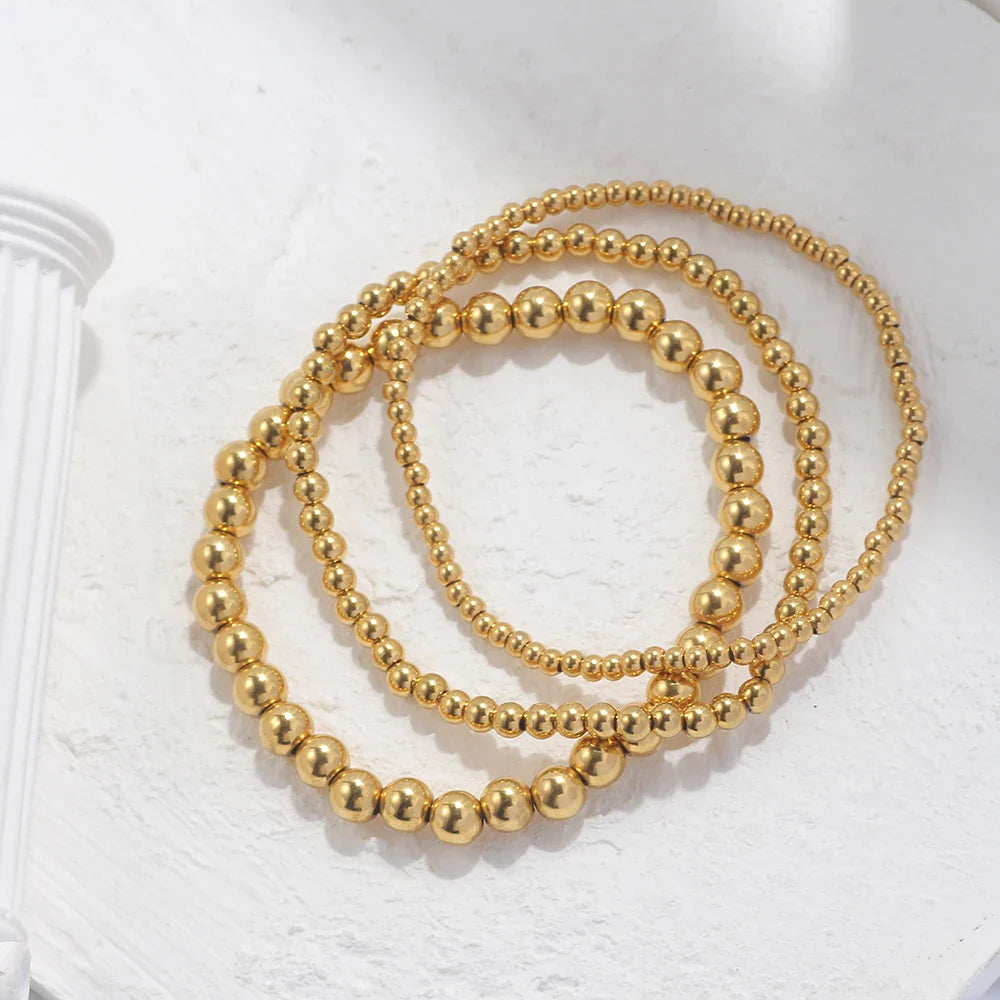 Lumière Perlé – 3-teiliges Armband-Set mit goldenen Perlen