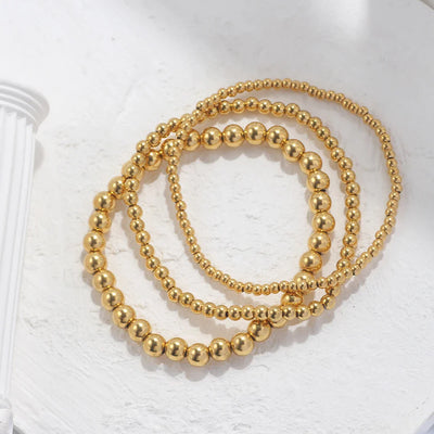 Lumière Perlé – 3-teiliges Armband-Set mit goldenen Perlen