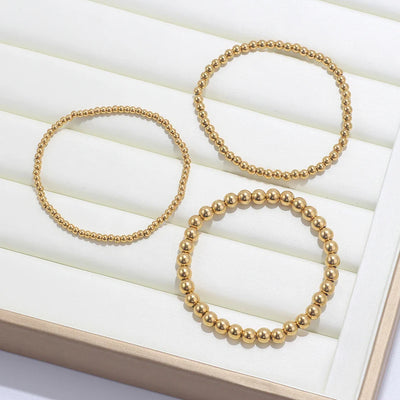 Lumière Perlé – 3-teiliges Armband-Set mit goldenen Perlen