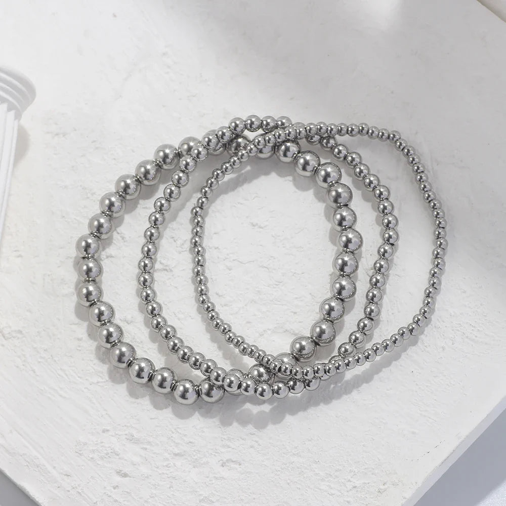 Lumière Perlé – 3-teiliges Armband-Set mit goldenen Perlen