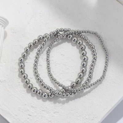 Lumière Perlé – 3-teiliges Armband-Set mit goldenen Perlen